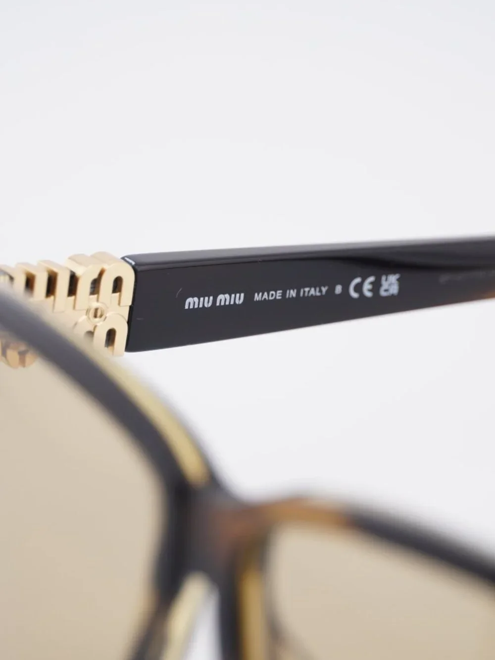 Miu Miu MU A08S 25E1OR Square Sunglasses - Striped Havana / Yellow